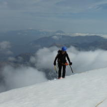 Reaching Spathi summit -Psiloritis at the far background